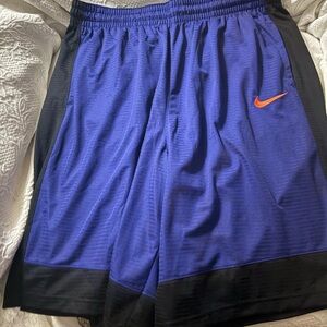 Nike Men's Royal Purple Athletic Shorts with Orange Swoosh and Black Trim